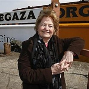 Mairead Maguire beside the MV Rachel Corrie in May 2010, on which she was kidnapped at sea